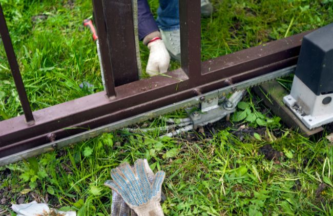 Automatic gate maintenance on a sliding gate motor and track system, part of reliable automatic gate servicing by Auto Gate Guys Brisbane Automatic gate maintenance on a sliding gate motor and track system, part of reliable automatic gate servicing by Auto Gate Guys Brisbane