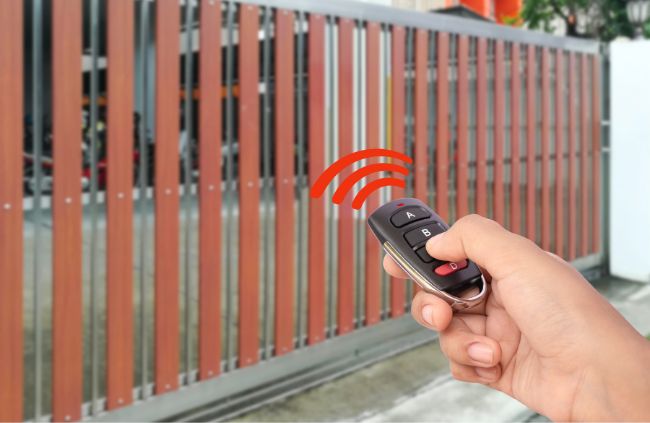 Wireless gate opener controlling a modern sliding gate installed by Auto Gate Guys Brisbane, offering convenience and security for Brisbane homes Wireless gate opener controlling a modern sliding gate installed by Auto Gate Guys Brisbane, offering convenience and security for Brisbane homes