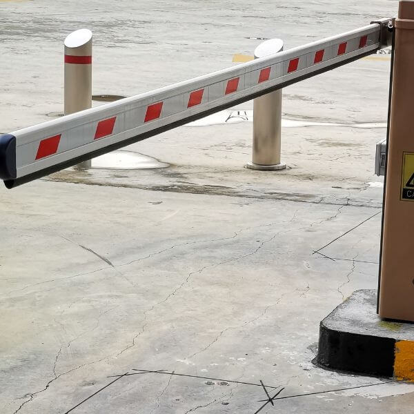 Automatic boom gate in Brisbane installed with wall-mounted control at a secure car park by Auto Gate Guys Brisbane Automatic boom gate in Brisbane installed with wall-mounted control at a secure car park by Auto Gate Guys Brisbane